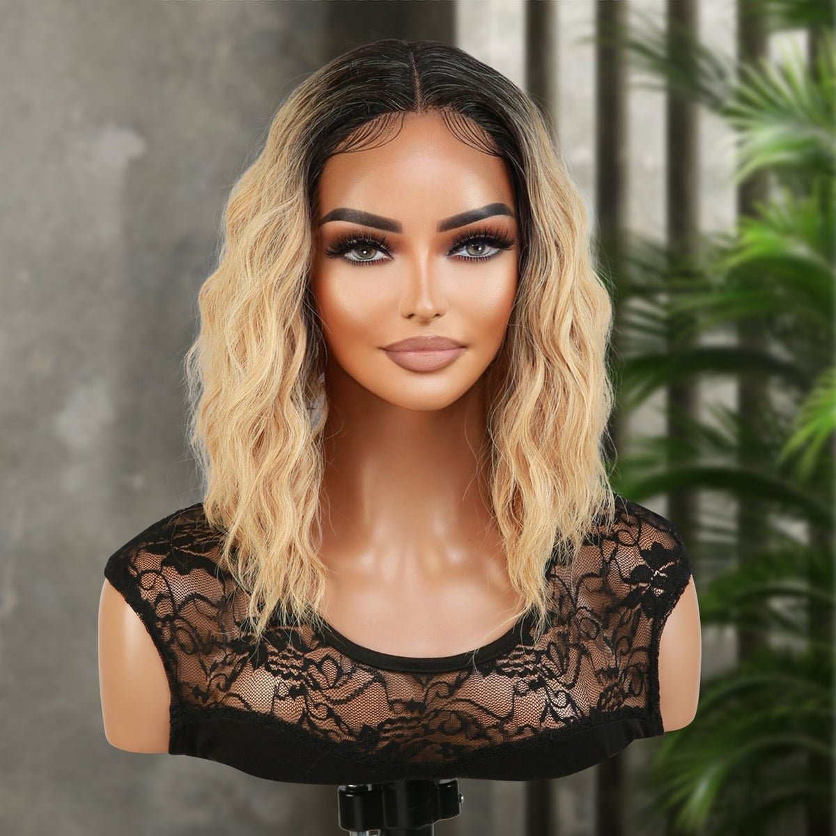 Introducing our gorgeous loose deep wave layered bob wig! Made with heat-resistant synthetic fibers, this wig features a middle part Swiss lace front for a natural-looking hairline. With a 12-inch length and curly wavy style, it adds volume and dimension to your hair. The layered bob cut adds a trendy touch. Perfect for black women, this easy-to-wear and style wig is a must-have. Shop now for ultimate style and versatility!