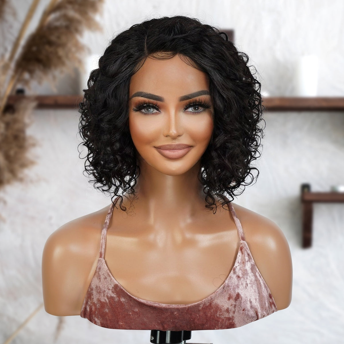 Shop affordable human hair wig. Center part short human hair bob lace front wigs made with Unprocessed Virgin Human hair, It has natural hairline which can be customized, Fits All Face Shapes. Glueless Minimalist Lace Bob Wig, Short curly bob is perfect for everyday use or any other special occasion, Ready-to-wear, Durable HD Lace that blend in perfectly